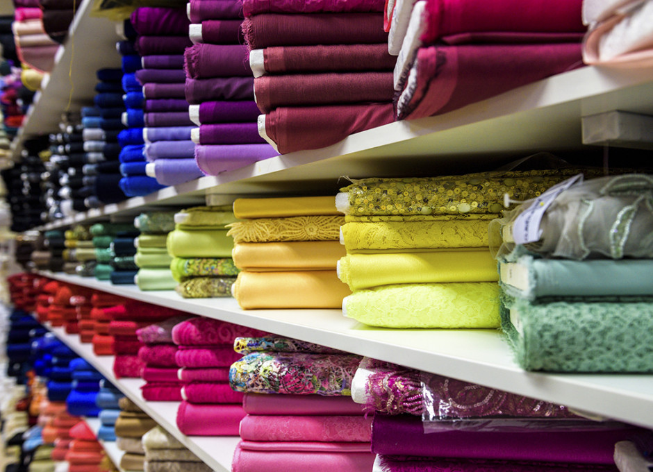 Rolls of fabric and textiles in a factory shop store